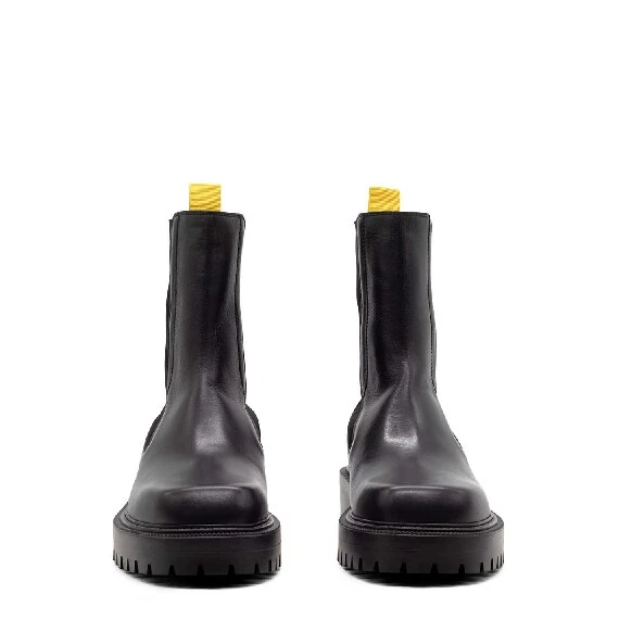 Black/yellow lug-sole Beatles boots