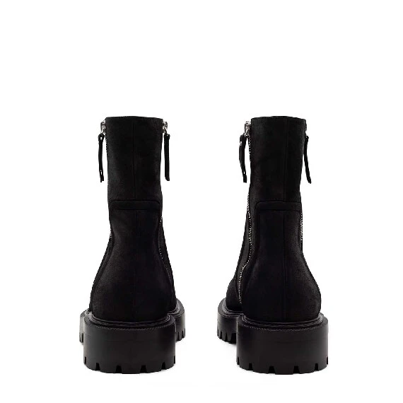 Zipped black split leather lug-sole ankle boots