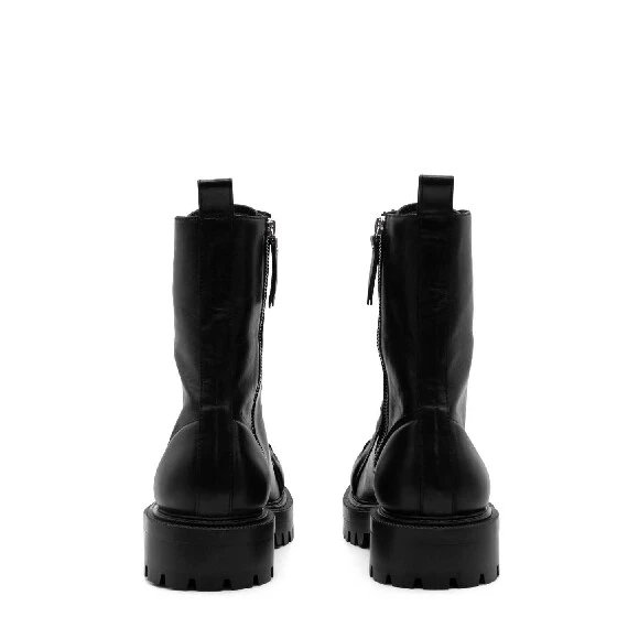 Black lug-sole combat boots