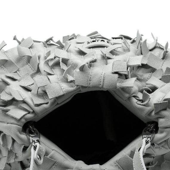 Sara<br />Ivory-white crossbody bag with fringe detail