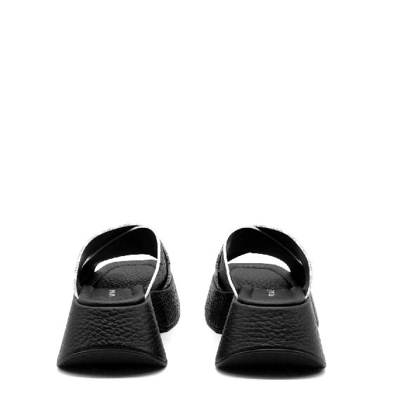 Mini Yoko criss-cross slip-ons in soft black nappa calfskin