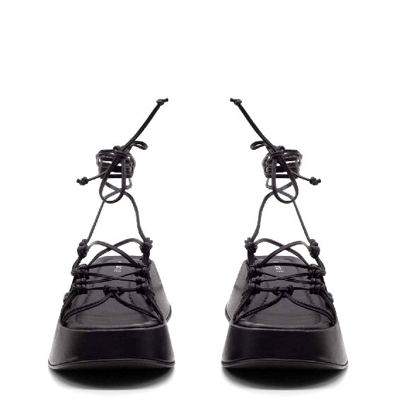 Mini Yoko criss-cross sandals in soft black nappa calfskin
