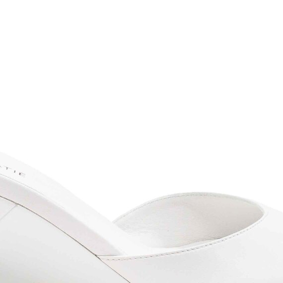 White Swan slip-ons