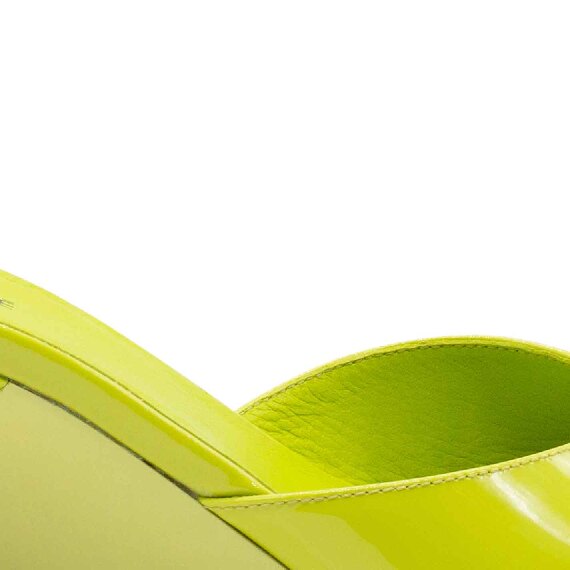 Acid-green Swan patent leather slip-ons