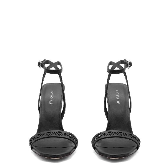 Openwork monogram sandals in black calfskin