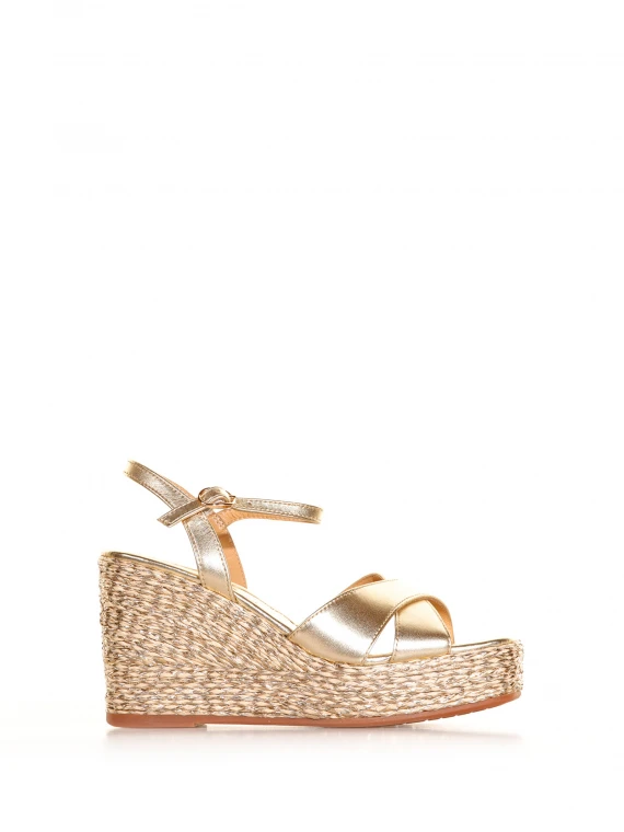 Sandal in laminated leather with wedge