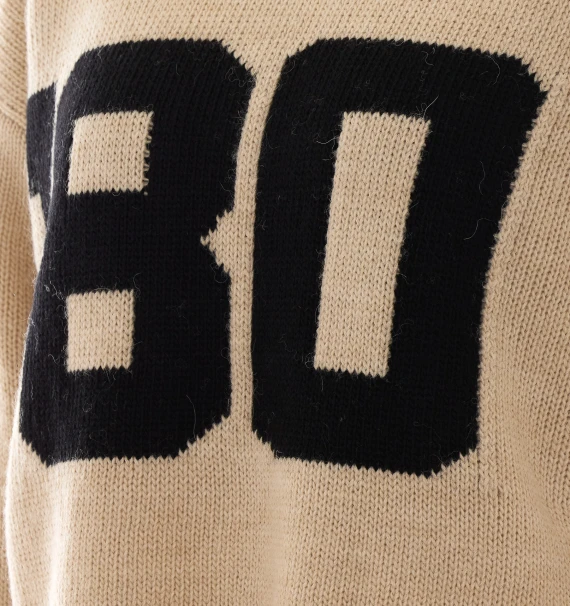Beige sweater with '80 motif Aniye By