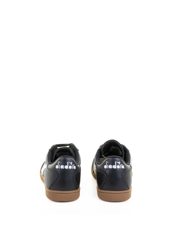 Sneaker nera in pelle e suede