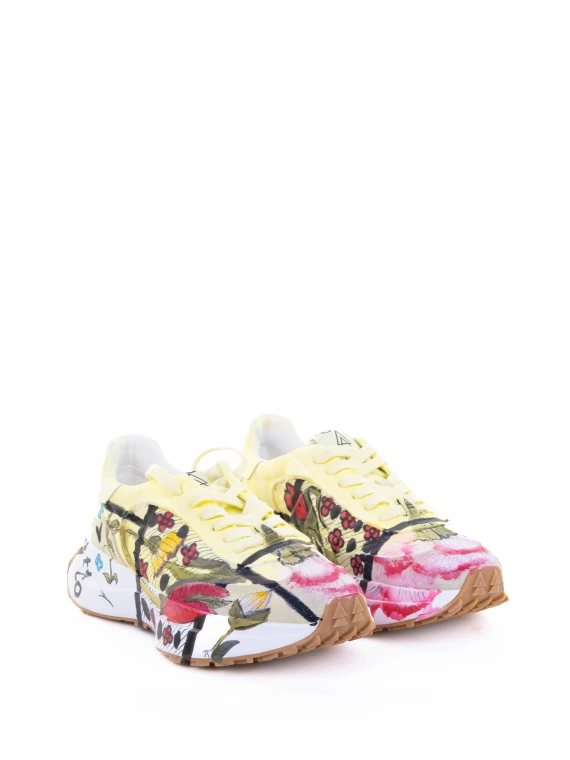 Sneaker gialla motivo floreale