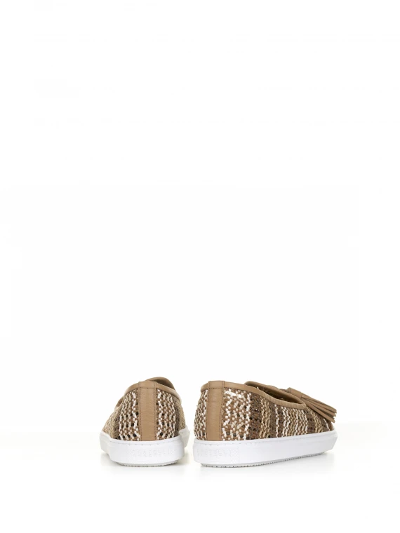 Slip-ons in woven leather with tassels