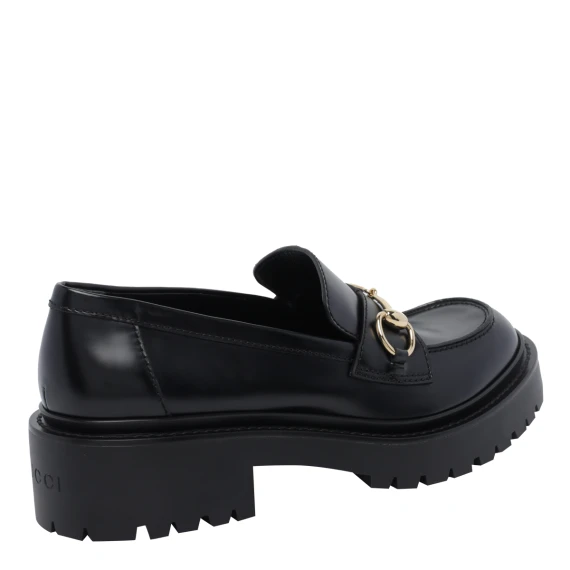 Black loafers with metal detail Gucci