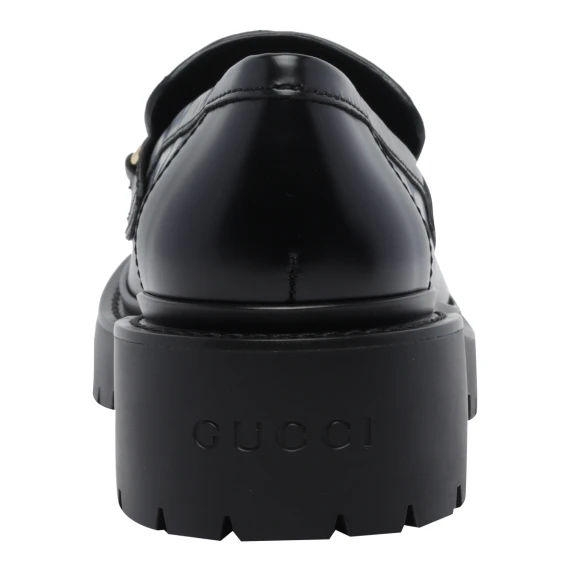 Black loafers with metal detail Gucci