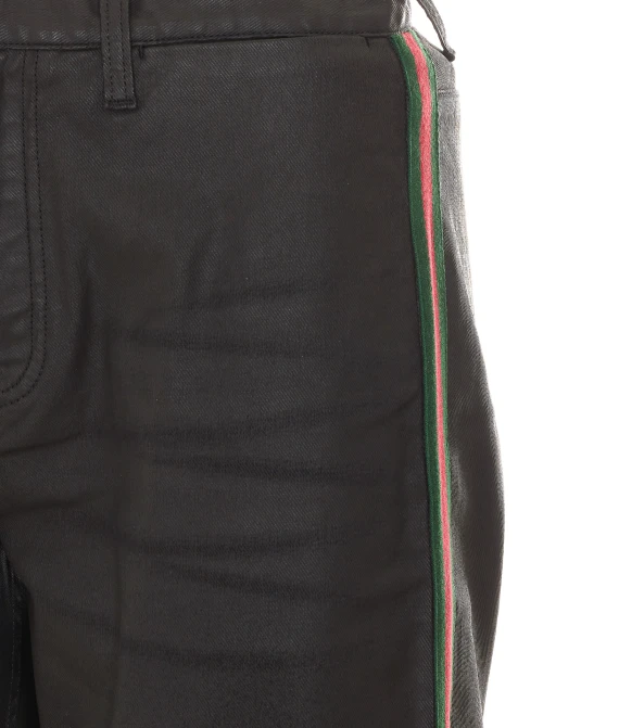 Pantaloni neri in denim twill spalmato Gucci