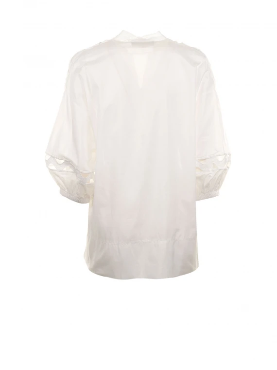Shirt with shoulder and sleeve openings