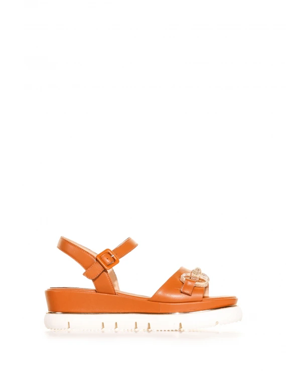 Orange sandal with hook accessory