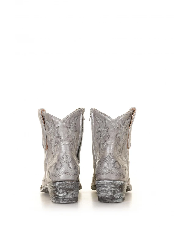 Texan ankle boot with worn effect silver