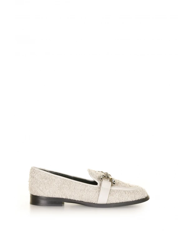 White moccasin with jewel buckle