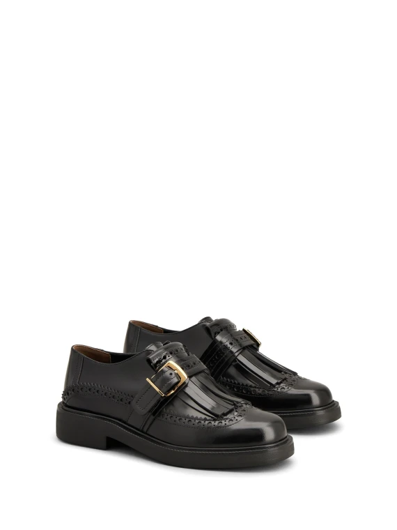 Monkstrap in pelle con bucature all'inglese a coda di rondine e frangetta