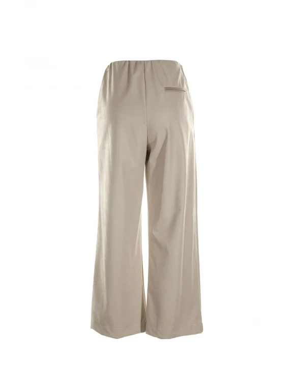 High-waisted trousers in beige leather