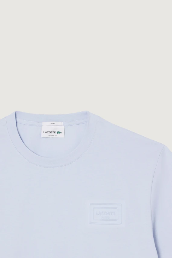 T-shirt in jersey con marchio goffrato