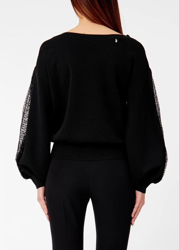 Maglia nera con maniche effetto pizzo