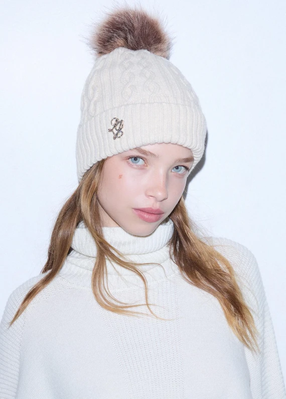 Cappello a cuffia a coste con pompon