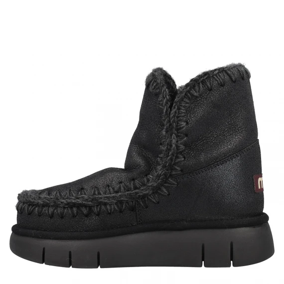 Stivaletto in montone eskimo nero laminato