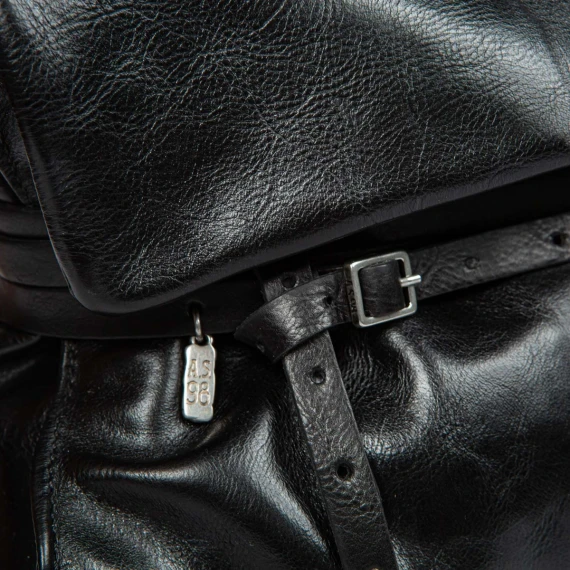 black leather briefcase with a rolled strap