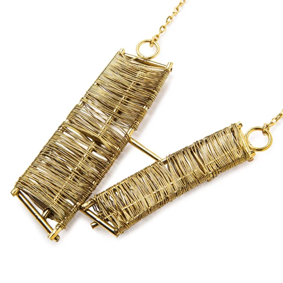 gold necklace with metallic accents