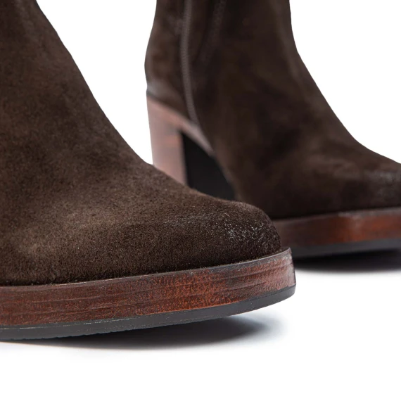 Coffee-colored suede boots with heels and a platform