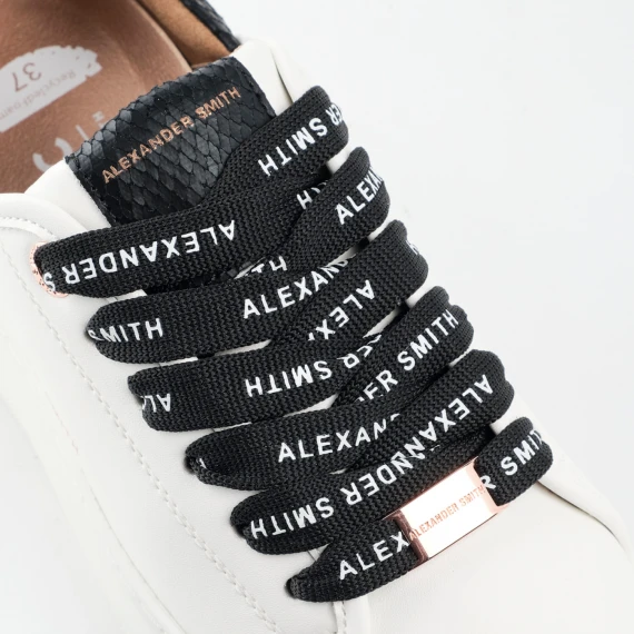 Sneakers vegana bianca con sperone e linguella in stampato pitone nero 